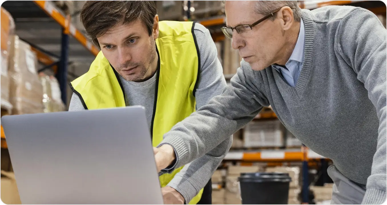 Men Warehouse Working Laptop